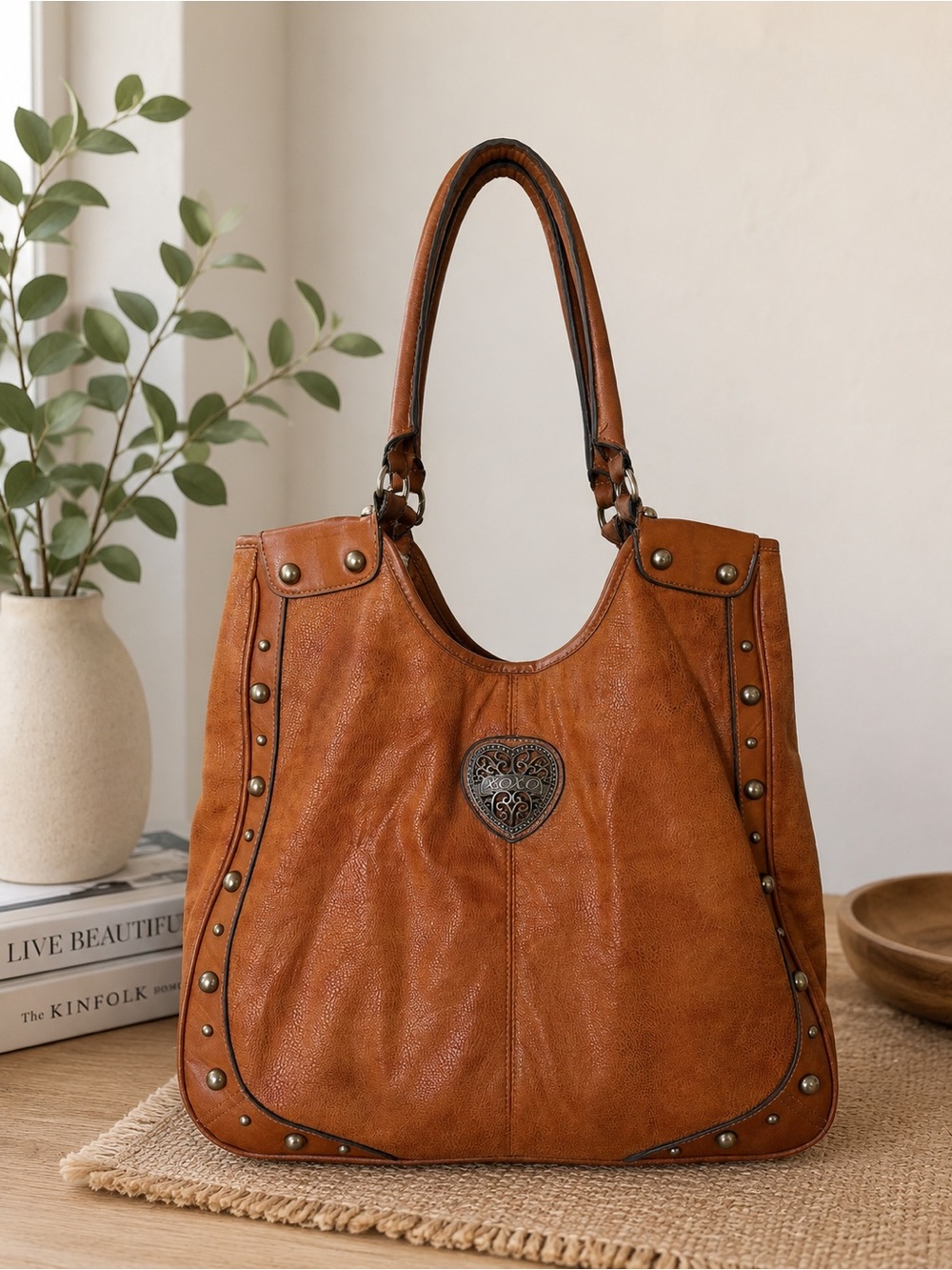 Vintage-Inspired Tan Leather Tote Bag with Heart Medallion